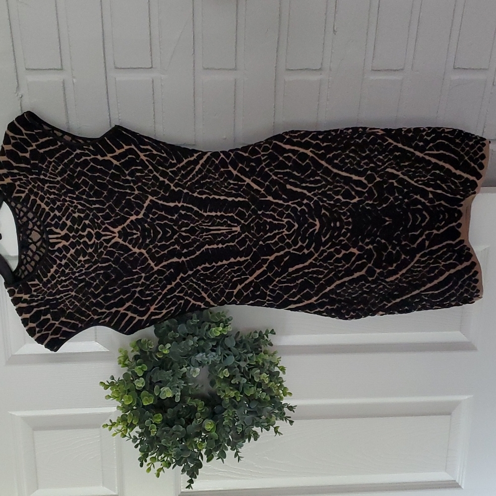 RVN black and creme dress size medium.